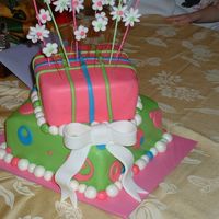 Pink & Green Whimsy 6 & 8" squares covered in fondant with fondant flower accents and bow.