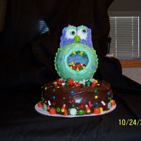 100_0917.jpg This cake was inspired by one that was featured in a Wilton Yearbook.