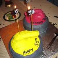 Birthday Curling Cakes! For a curling enthusiast! Double layer chocolate cakes, grey buttercream icing for the curling rocks, red and yellow coloured buttercream...