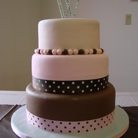 Pink And Brown 8, 10, and 12 in round covered with fondant