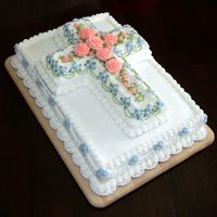 Peach Cross This cake was done in buttercream. It was actually for the funeral of a family member, but would make a lovely baptism or communion cake as...