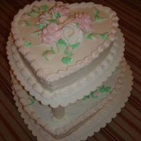 2 Tier Valentine Cake This is French Vanilla top tier and Chocolate lower tier with butttercream frosting.