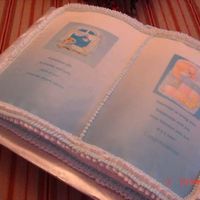 Powder_Blue_Baby_Bear.jpg This is a simple chocolate cake with buttercream frosting and I used Frositng sheets on each "page"
