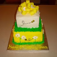 Bumblebee Cake Here is the cake that put me in such a bad mood. The icing and stacking job on this were terrible but the decorations turned out pretty...