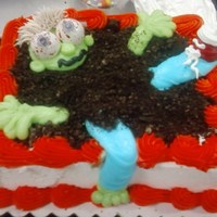 Zombie In Cake buttercream icing and oreo crumbs