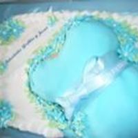 Pregnant Belly I made this for a friend who has tried to have a baby for 7 years and she is finally having a boy ;)Rich's Bettercream with Fondant