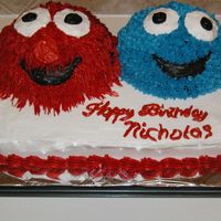 Elmo And Cookie Monster 9X13 pan and mini ball pan, all buttercream.