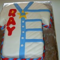 The Shirt I made this cake for my brother in law's birthday! he loved it! everything made out of fondant. pineaple pound cake