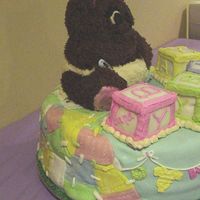 Baby Bear Blanket Photo 2 of 2. This is the side view. The entire back of the cake was a patchwork quilt made of fondant. This helped to cover mistakes I...