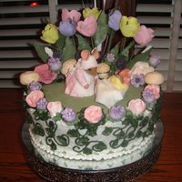 Sweet Emmaline I did this cake for my sisters baby shower. I made the mice and tulips from Fondant. The mushroom are made from meringue and the flowers...