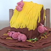 Piggies This is my 2nd cake ever. I saw it in Debbie Brown's book and thougt it was so cute I had to try. It was just for a bit of fun.