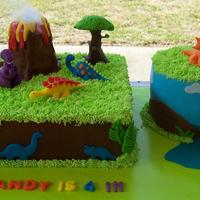 Dinosaur Cake . Round and square cakes. Chocolate and butter cream with fondant accents . I got the inspiration to make the fondant dinosaurs and volcano...