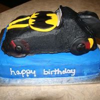 Batmobile This was for a mother who didn't want fondant so I only used fondant accents. I'm just not good at getting very smooth icing but...