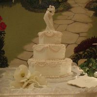 P72201011.jpg This was my wedding cake, made by Johnnies Sweet Creations Bakery of Oklahoma city Oklahoma. I'm only uploading it because I didn'...