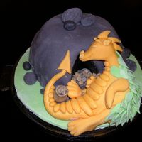 Sleepy Dragon I made this cake for my fathers birthday. I was inspired by Debbie Browns "Enchanted Cakes for Children". It wasn&acute;t...