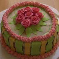 Practise Cake Yellow cake with strawberry filling, white ganache, mmf and my first mmf roses.