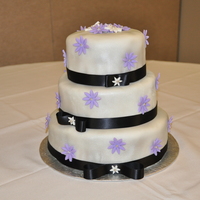 Purple Daisy Bridal Shower All the bride told me was my colours are purple, white, silver and black and she liked daisies. I airbrushed the cake with silver but very...