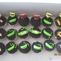 Growing Baby Cupcakes Made for a school teacher who announced she was pregnantDirt is oreo cookie crumbs, all food/baby is made with coloured tootsie rolls