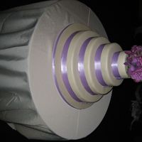 Round Wedding Cake Ivory & Lavendar wedding cake. 18, 14, 10 & 6 inches, vanilla w/fresh strawberrys, and mocha chocolate