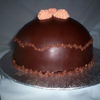 Chocolate Dome (Aka Giant Truffle) made with dome shaped cake pan; chocolate cake with chocolate cream filling;covered with chocolate buttercream & the chocolate fondant...