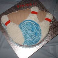 Strike! bowling banquet cake for a small local bowling league. The ball is white & 2 shades of blue; border matches colors of the ball; all...