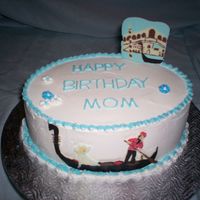Gondola Birthday cake for a lovely large originally from Venice, who just turned 80. She likes the color blue & likes things to be simple; the...