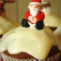 Santa Cupcake The cream cheese topping on these carrot muffins gives a great snow look and is extremely tasty. The Santa figure is totally edible,...