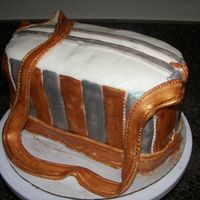 Gold And Silver Purse Cake This cake is a flashback to the past. I had a purse like this in high school. I wanted to do someting sentimental. I enjoyed doing this...