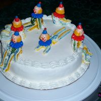 First Clown Cake Our instuctor had us stripe our bags instead of doing full color clowns. I had no design per say, was just attempting different clown...