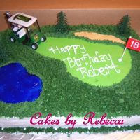 Golf Cake This is chocolate cake with bavarian creme filling. Decorated withall buttercream. Water is piping gel tinted blue. This was really fun to...