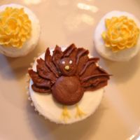 Turkey & Mum Cupcakes My husband asked me to make some Thanksgiving cupcakes for a meeting at his work tomorrow. These were all that I could come up with...