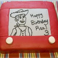 Toy Story Etch-A-Sketch Woody Cake I made this for my daughter's 3rd birthday. First time making MMF. She LOVED it!