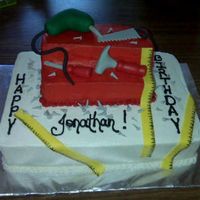 Tool Box This was made for a contractor, his wife told me to go with a "constructiony" theme! Tools and nails made of fondant. Covered in...