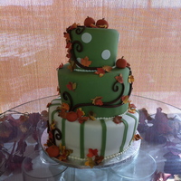 Autumn's Cake Fall-themed wedding cake inspired by a photo the bride found. Gumpaste autumn leaves and homemade fondant.