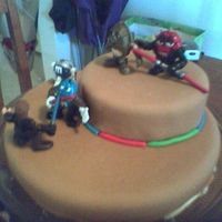 M&m's Star Wars Cake MMf covered cake with m&m toys on top