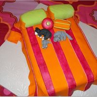 Bed And Breakfast Shower Honey bun cake, covered in fondant, pillows and animals are gumpaste, dark pink fondant stripes painted with grain alcohol and luster dust...