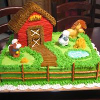 Img_6063.jpg Mom of b-day girl wanted to use her favorite barnyard toys. First birthday cake goes with pig in mud smash cake.