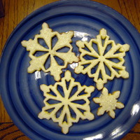 Snowflake Cookies all butter sugar cookie with royal icing and sugar crystals.