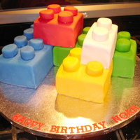 Lego Cake This was fun to make. The little round dots on top are big marshmallows cut in half and covered in fondant.