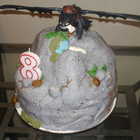 Toothless/nightfury For my son. I took the easy way out and just did a toy on top, but the rest of it I did...fish, plants, rocks...