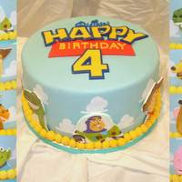 Toy Story Hand Painted cake of a lot of the toy story characters. This was a lot of fun to make!Darn good chocolate cake with cookies and cream...