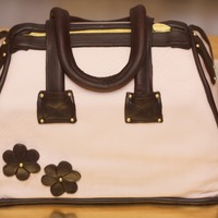 First Purse Cake This was my first purse cake that I did in a class that I took. I was so excited and can't wait to make another one.