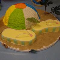 Bizcocho De Verano Bola de playa y flip flop.