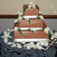 Chocolate With Calla Lilies horrible location, Texas in August with a broken ac - the chocolate strawberries melted all over the white grooms cake - but I was happy...