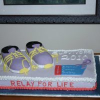 Relay For Life Made for my daughters Relay for Life survivors banquet, she ran in the relay and helped with the dinner. It is a orange half sheet cake...