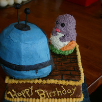 Penguin With Tv Used small bear mold pan for penguin (just cut off ears), scupled 6" cake to form TV.