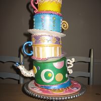 Topsy Turvy Tea Party Display cake made for local kid's cooking school. Fondant, luster dust, and air brush details.