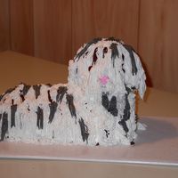 Puppy Cake This was a cake I made for a girl who was quitting and going to open a dog grooming business. My dirty little puppy. She loved it. It is...