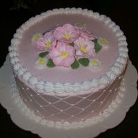 Birthday Cake WASC w/raspberry bc. I used Sugarshack's method of frosting the cake. It's the best! My friend thought it was covered in fondant...