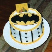 Batman Emblem WASC w/pineapple filling. Emblem is a FBCT. Picture of Robin & Batman made of cardstock. Says "Holy Cakes Batman - it's Bleu...